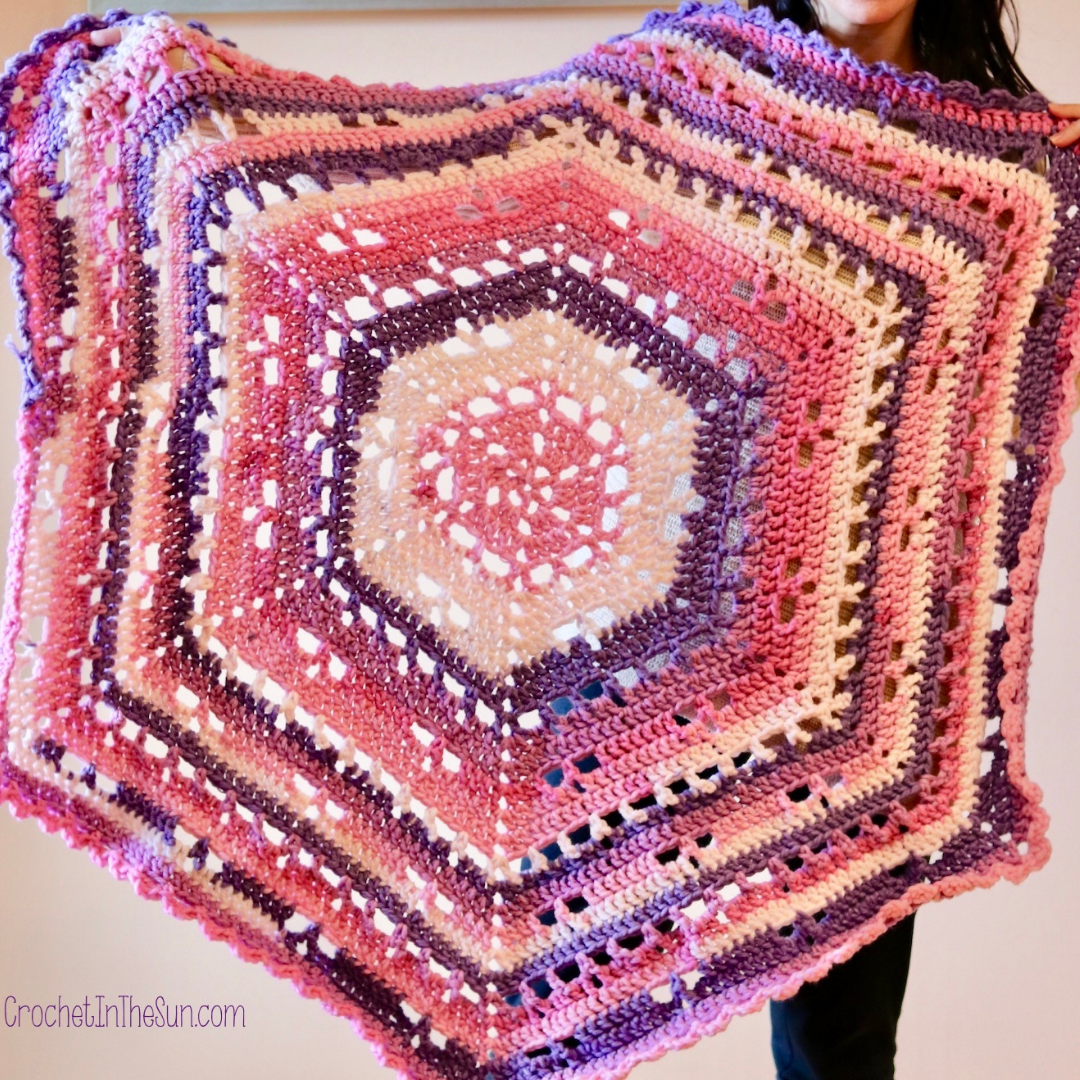 What can I crochet with self-striping yarn? This Cloudberry Blanket pattern by Mijo Crochet was made using Caron Chunky Cakes. This free pattern is beginner friendly and so fun to make! This is a great pattern to use for self striping or whirl yarn! #crochet #crochetblanket #crochetforbeginners