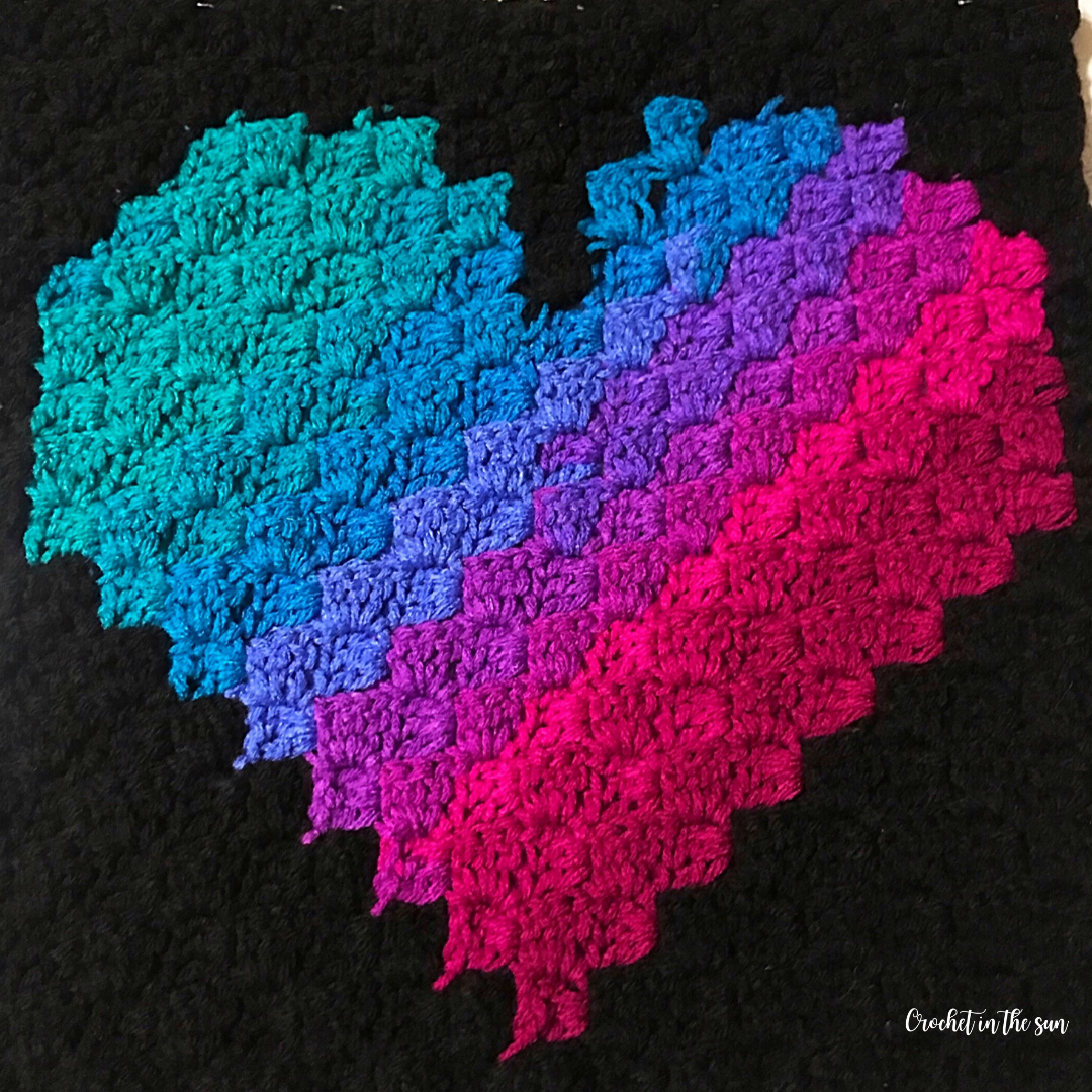 Free C2C crochet heart pattern. This design is super colorful and fun, great crochet project for beginners learning to C2C!