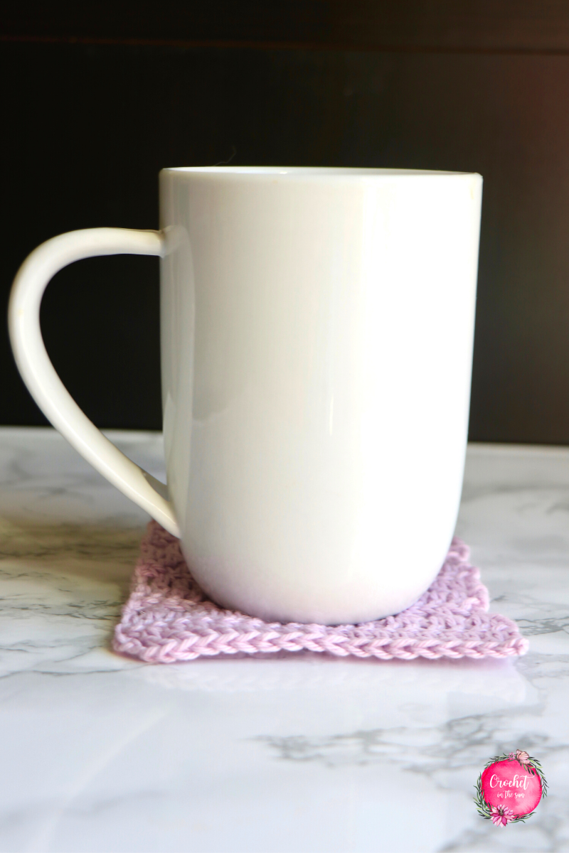 Free crochet coaster pattern (or crochet mug rug pattern). This coaster pattern is easy and quick! It's beginner friendly and only takes 30 minutes! Photo tutorial is included as well!