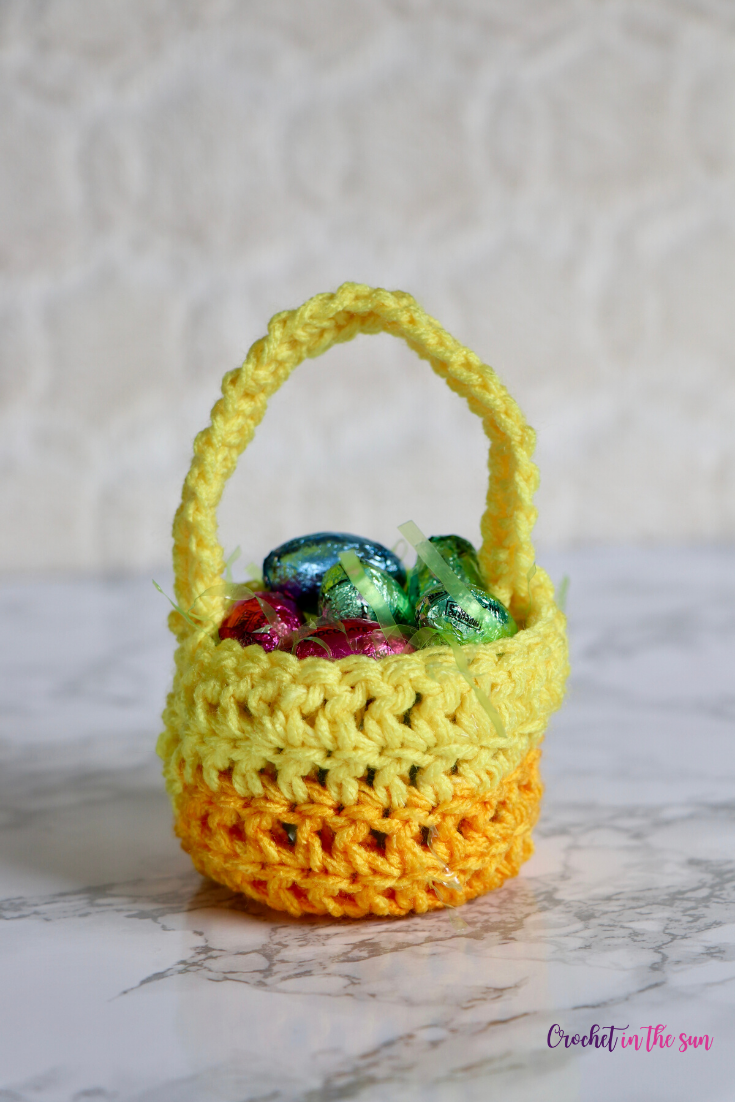 This crochet easter basket was made using Red Heart Stripes. This FREE crochet pattern is beginner friendly and very cute! #crochet #easter #eastercrochet