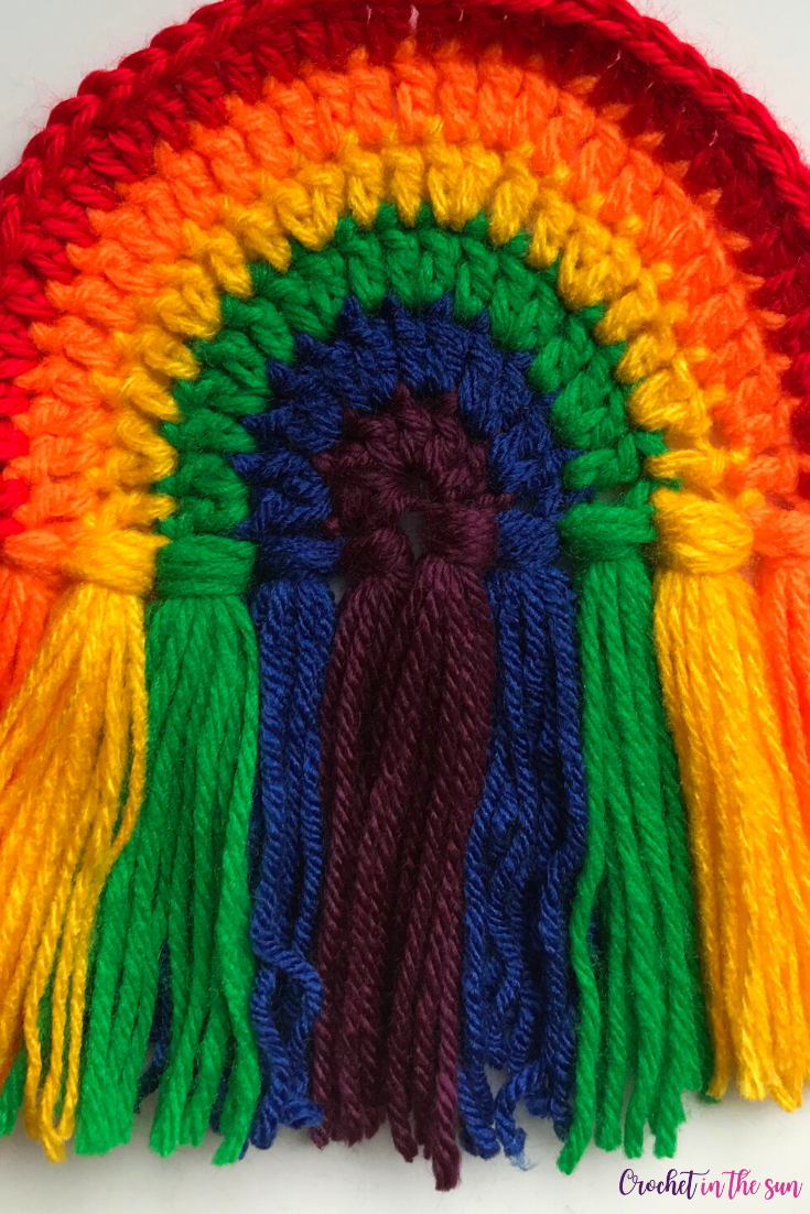 FREE crochet rainbow pattern. This easy crochet project is quick and beginner friendly. Includes a step by step photo tutorial. Crochet ideas full of color!
