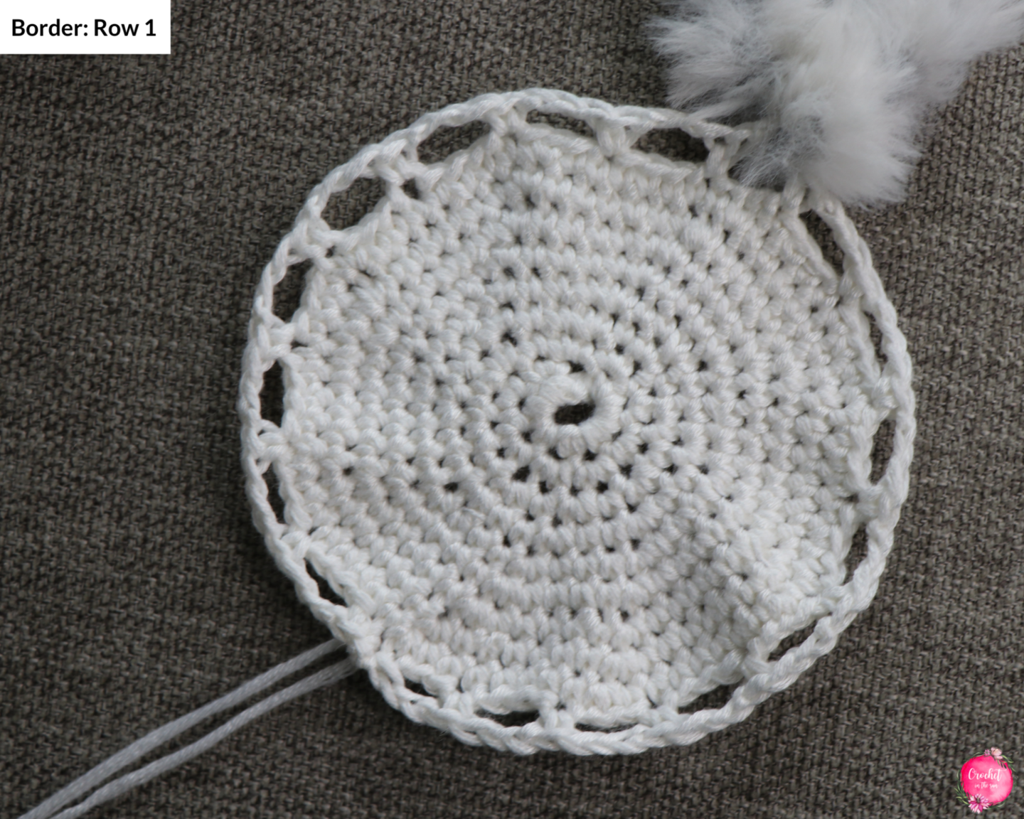 Lion Brand Go for Faux crochet coaster pattern! Photo tutorial for an easy crochet coaster pattern that is quick, beginner friendly, and beautiful. This shows the beginning of the border.