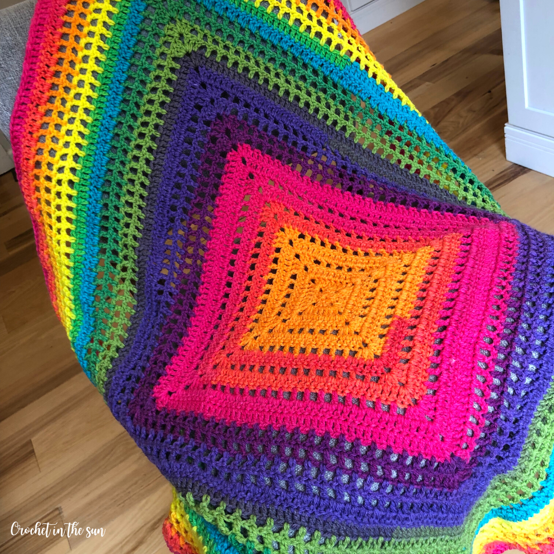 Easy crochet blanket pattern. Beginner friendly. Includes a photo tutorial and written pattern. Make your own Open Windows crocheted blanket!